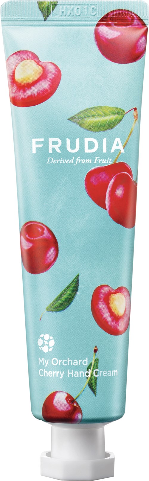 Eine Tube Kirsch-Handcreme mit Kirschen und Blättern auf hellblauem Hintergrund, mit "FRUDIA" und "My Orchard".