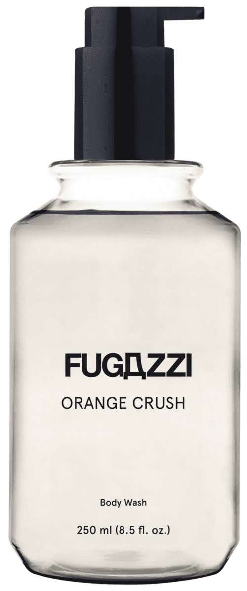 Eine klare Körperwaschflasche mit schwarzem Pumpkopf, beschriftet 'FUGAZZI Orange Crush'.