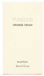 Ein Parfümverpackung mit der Aufschrift 'Fugazzi Orange Crush', beige Hintergrund und goldener Schrift.
