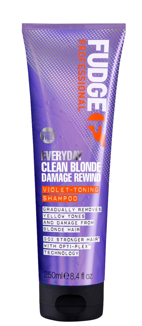 Paars shampoetube met oranje en witte tekst voor blond haar, bevordert schadeherstel en toon correctie.