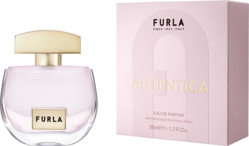 En ljus rosa parfymflaska med en guldlapp och en rosa box med gyllene och svarta texter.