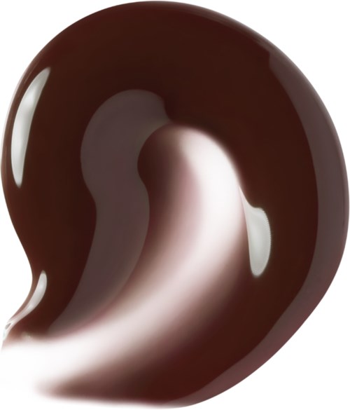 En glänsande, slät brunsak object med ett vitt streck inuti och reflektioner på ytan.