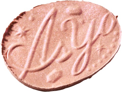 En rosa, oval formad medicinpiller med text på.