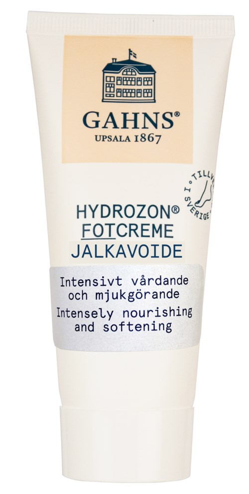 En vit tub med fotkräm med en beige etikett, märket Gahns, och beskrivning på flera språk.