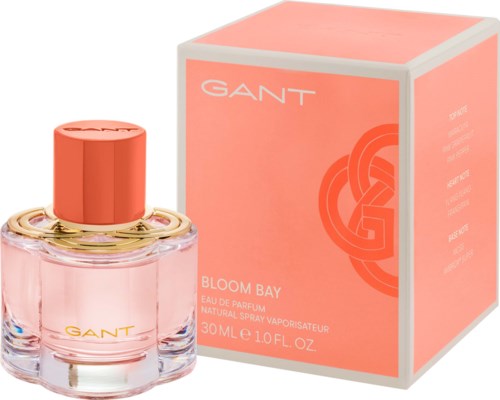 GANT Bloom Bay Parfümflasche mit rosa und orange Verpackung. Die Flasche ist rund mit einem orangenen Deckel.
