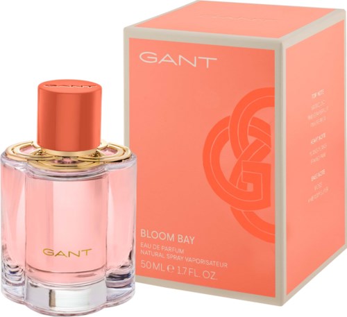 Rosa Parfümflasche und orange Karton mit goldenen Akzenten und GANT-Logo, für Bloom Bay Duft.