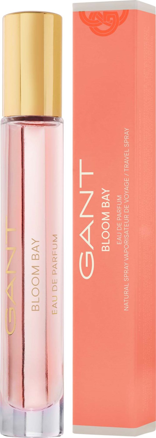 Eine rosa Parfümflasche mit goldener Kappe und passender Verpackung, beschriftet GAIANT BLOOM BAY.
