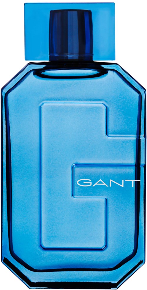 Eine blaue GANT-Perfume-Flasche mit schwarzem Deckel vor weißem Hintergrund. Die Flasche hat einen großen Buchstaben G.