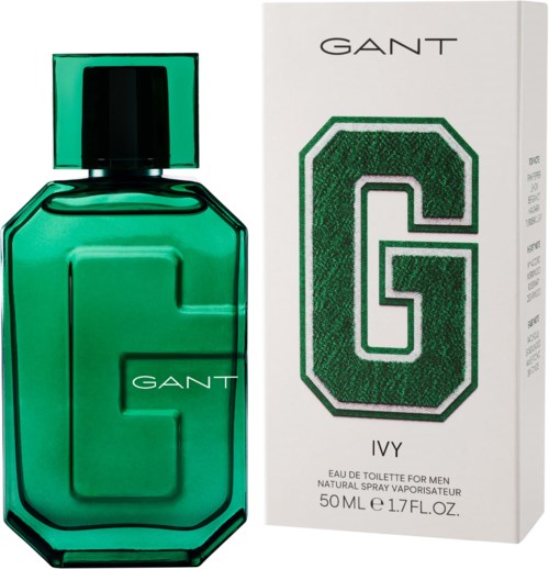 Eine grüne Parfüfflasche mit schwarzem Deckel und eine weiße Box mit großem G und 'GANT' darüber.
