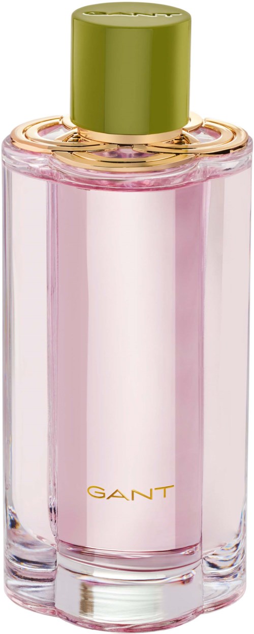 Ein rosa Parfümflasche mit einem goldenen Ring um den Hals und einem grünen Deckel.