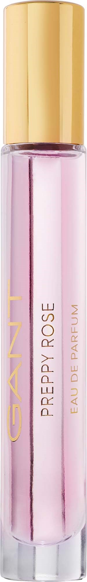 Parfum in een lange roze fles met gouden dop, gemerkt Preppy Rose door Carner. Elegant en vrouwelijk ontwerp.