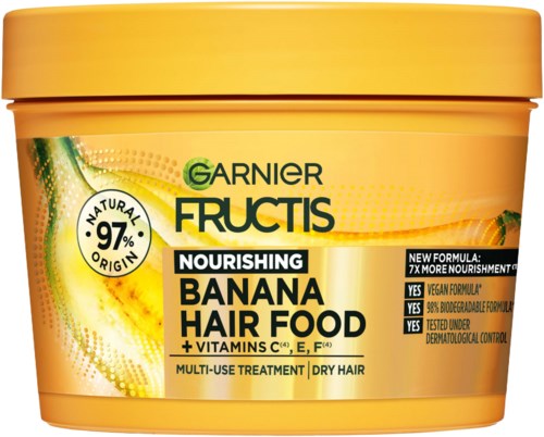 Een gele container Garnier Fructis Banana Hair Food voor voedend droog haar met vitaminen.