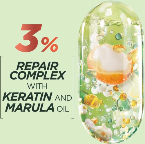 A cosmetic product label highlighting a 3% repair complex with keratin and marula oil, with a colorful gel-like appearance.