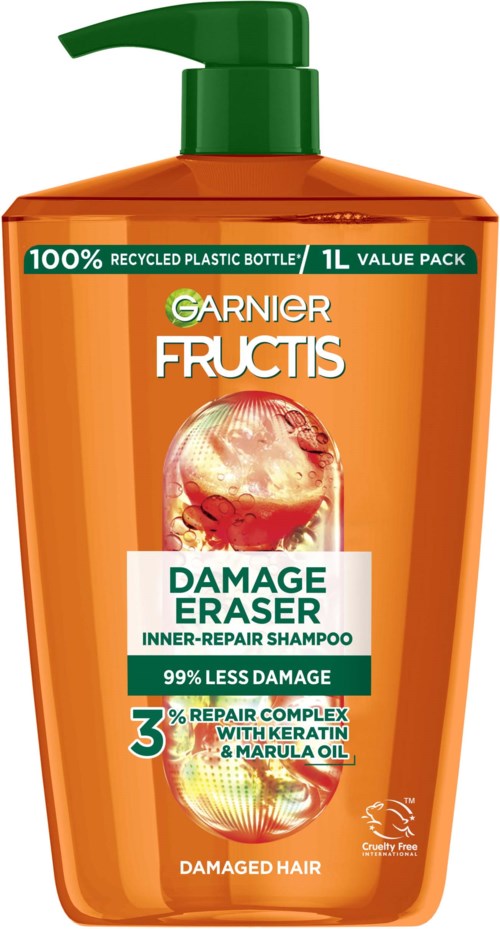 Orange bottle with green pump, labeled Garnier Fructis Damage Eraser shampoo for damaged hair, contains 1 liter.