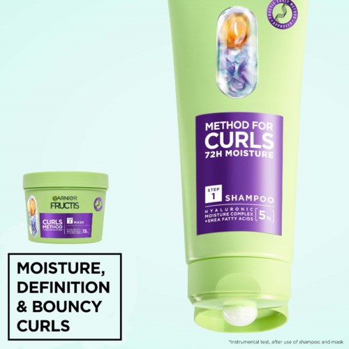Groene shampoefles van Garnier Fructis, labels vermelden krulmethode en 72 uur vocht.