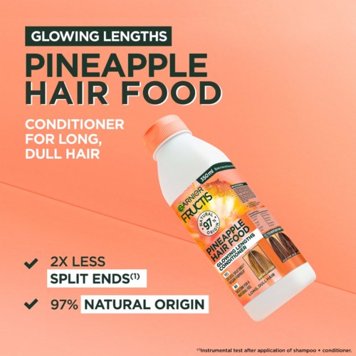 Etiket voor ananas haarverzorgingsconditioner, met nadruk op natuurlijke ingrediënten, minder gespleten punten en lang haarverzorging.