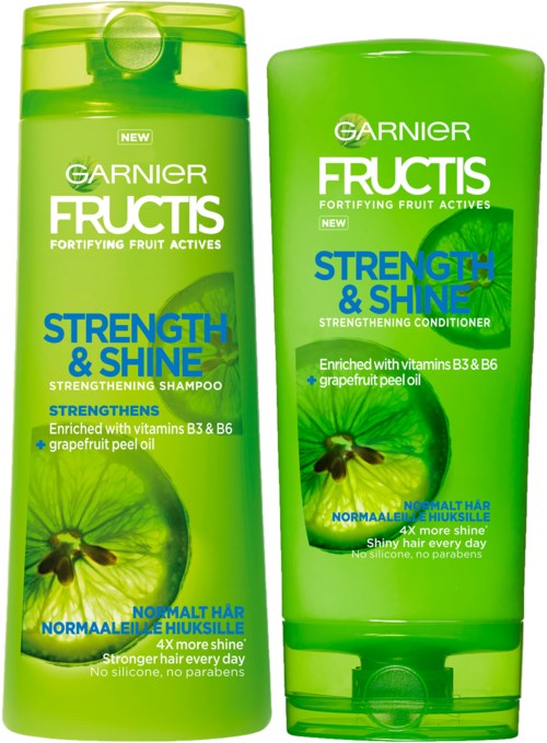 To grønne hårpleieprodukter, en flaske og en tube, har limebiter og tekst om styrke og glans.