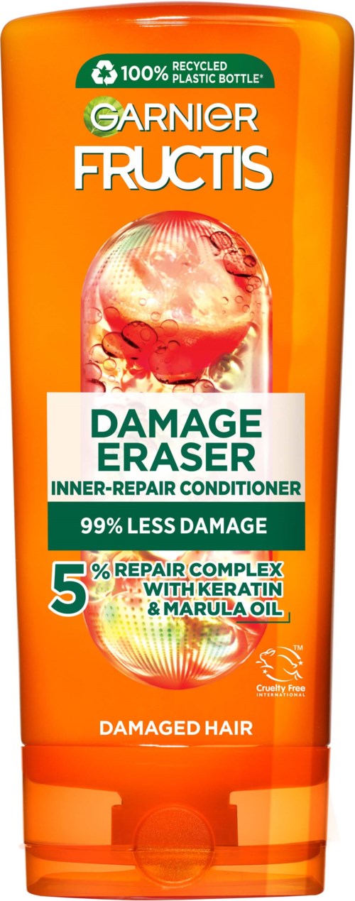 Oranje fles Garnier Fructis Damage Eraser conditioner, vermeldt gerecycled plastic, bevat keratine en marula olie, helpt beschadigd haar.