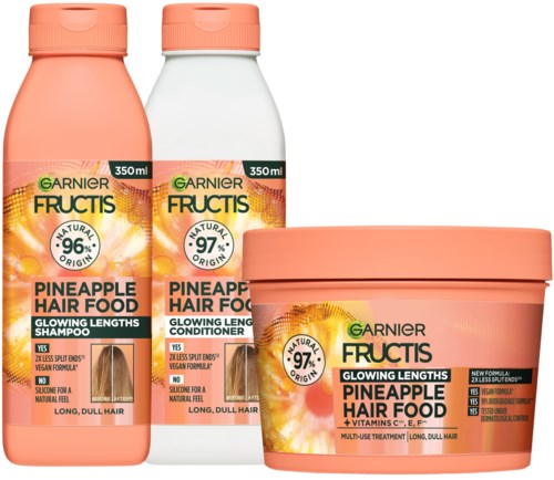 Tre Garnier Fructis hårpleieprodukter for langt, livløst hår: sjampo, balsam og hårmaske med ananaslukt.