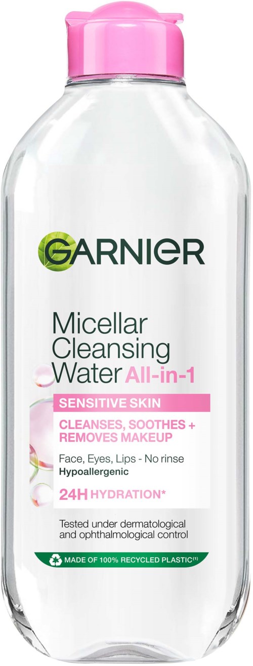 Clear bottle with pink cap, label shows Garnier micellar cleansing water for sensitive skin, 24-hour hydration.