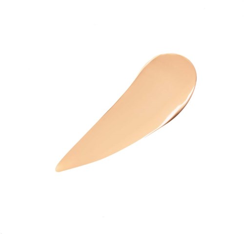 Cream concealer in a beige shade with a tapered, angled shape.
