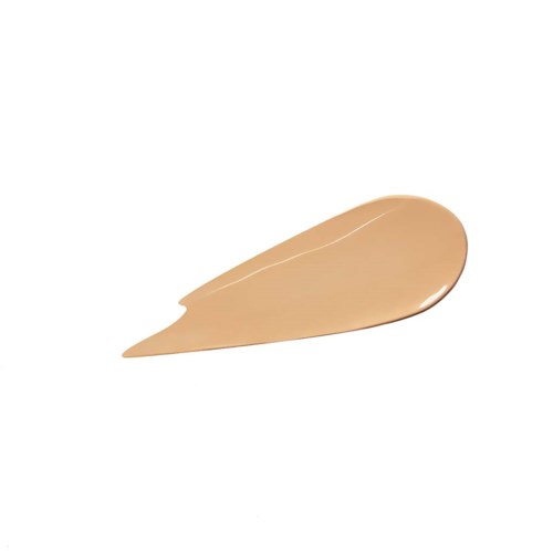 Beige liquid foundation swatched on white background with a smooth, rounded edge.