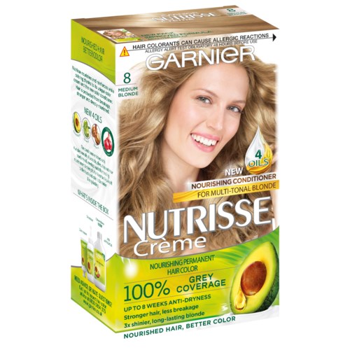 En ask med Garnier Nutriessé blond hårfärg med en kvinna som ler, visar glänsande blond hår. Boxen nämner närande balsam och färgcoverage.