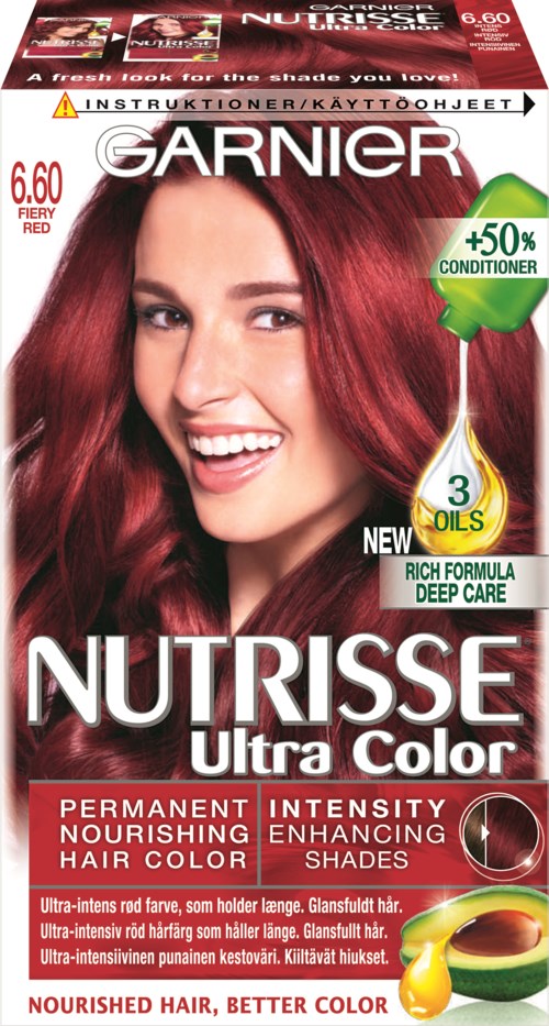En kvinna med glänsande rött hår som ler, på ett hårfärgningspaket märkt Garnier Nutrisse Ultra Color.