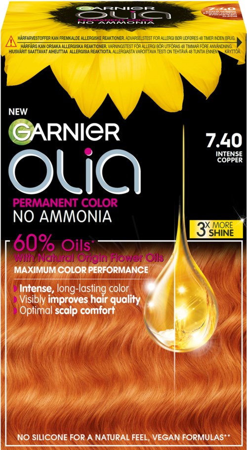 Hair dye box with yellow flower, info on color, no ammonia, and natural oils for shiny, healthy hair.