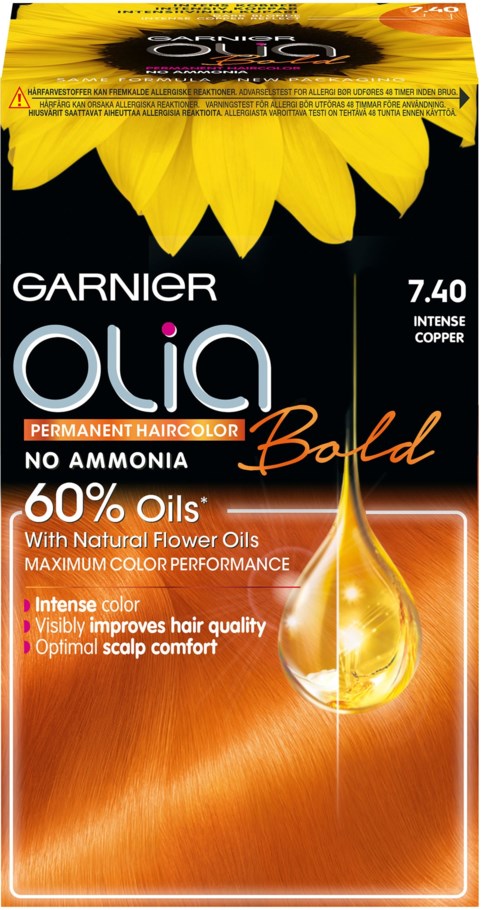 Lådan visar Garnier Olia hårfärg, mahogny nyans, med solrosor och oljedroppar, som betonar naturliga oljor och färgförbättring.