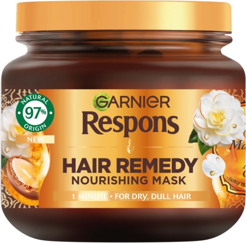 Purkki Garnier Respons Hair Remedy ravitsevaa kasmua, jossa valkoisia kukkia ja sitrusta etikettissä.