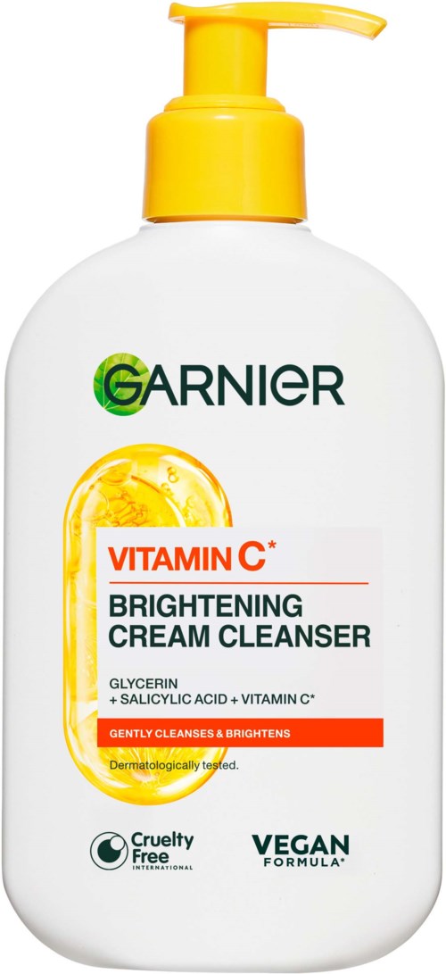 Garnier Vitamin C Brightening Cream Cleanser with a yellow pump, label shows ingredients and cruelty-free and vegan icons.
