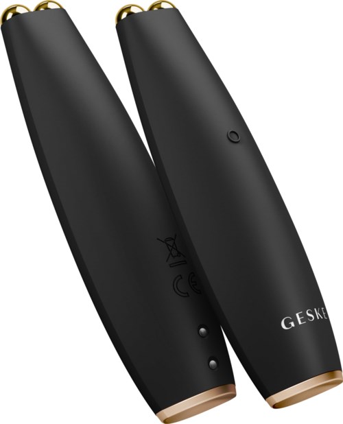 Zwei schwarze Handpflegegeräte mit goldfarbenen Akzenten, vermutlich Trimmer oder Rasierer, seitlich gesehen.