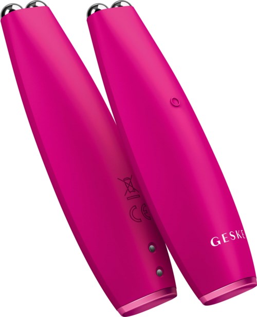 Two pink handheld devices, likely personal care or grooming tools, with buttons and symbols on their surfaces.