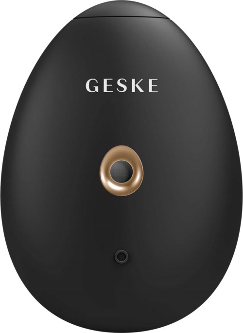 Ein schwarzes, ovales Gerät mit einem zentralen Ring und dem Wort 'GESKE' oben.