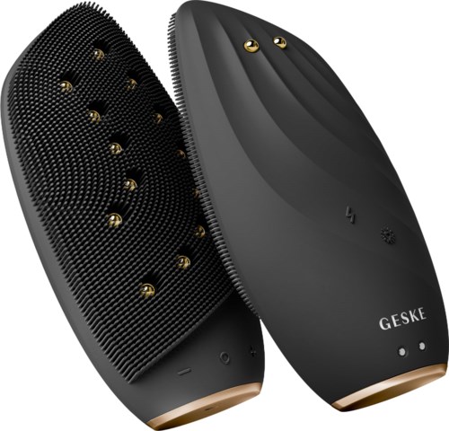 Zwei schwarze elektrische Pflegebürsten mit Golddetails, für Haar- oder Bartstyling.