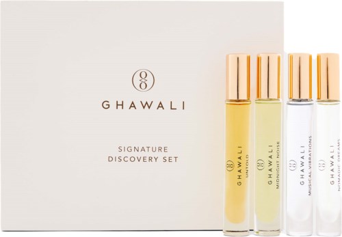 A white box with the Ghawali logo and four small perfume bottles in gold, green, and clear colors.