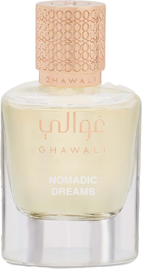 A perfume bottle with a light yellow liquid, a peach cap, and the text Ghawali Nomadic Dreams on the front.