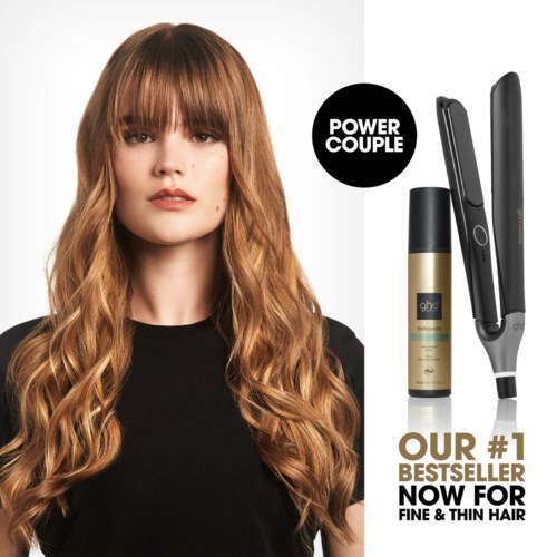 A woman with long, wavy red hair poses for a beauty product advertisement. The text highlights hair styling tools and hair care.