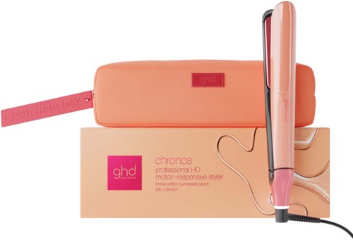 A pink ghd hair straightener with matching case and box, displaying branding and packaging details.