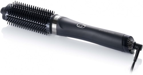 A black heated round brush with a handle and plugged cord, used for drying and styling hair.