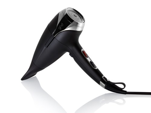 A black and silver hair dryer with buttons and a cord, placed on a white background.