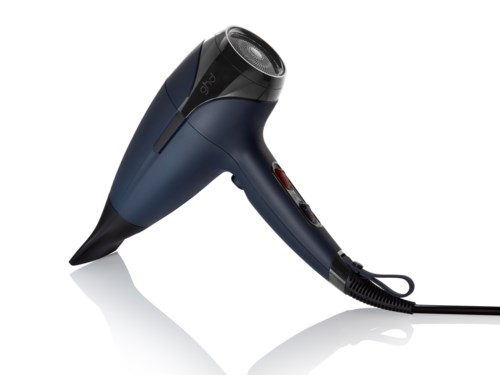 A black and blue hair dryer with a handle, power button, and cord, resting on a white surface.