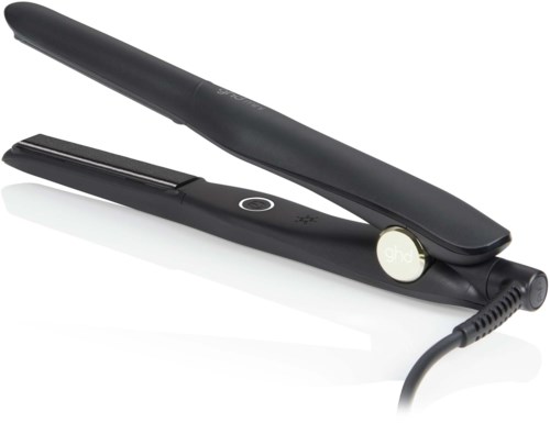 A black hair straightener with a sleek design and a digital display button.