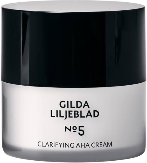 Een witte pot met een zwarte deksel, gemarkeerd Gilda Liljeblad No5 Clarifying AHA Cream.