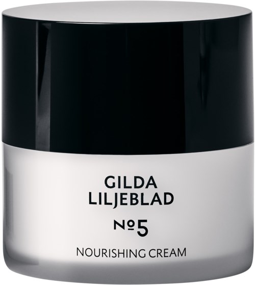 Een pot Gilda Liljeblad No. 5 voedende crème, zwart-wit label, cilindrische vorm, moderne uitstraling.