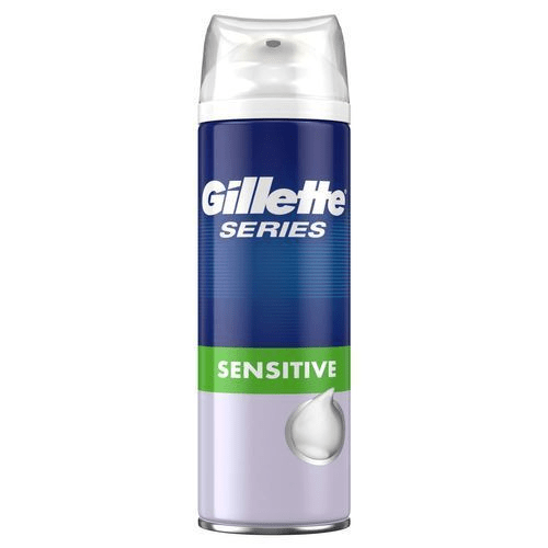 Eine blaue und weiße Dose Gillette Sensitive Rasierschaum mit grünem Etikett.