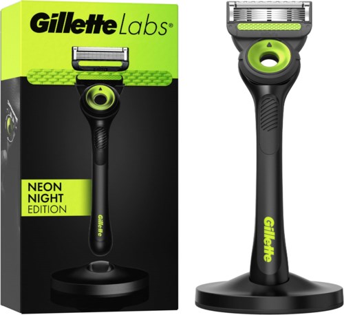 Gillette Labs Rasierer mit Neon-Grün und Schwarz, neues Design, auf einem Ständer. Verpackung zeigt einen ähnlichen Rasierer und Box.