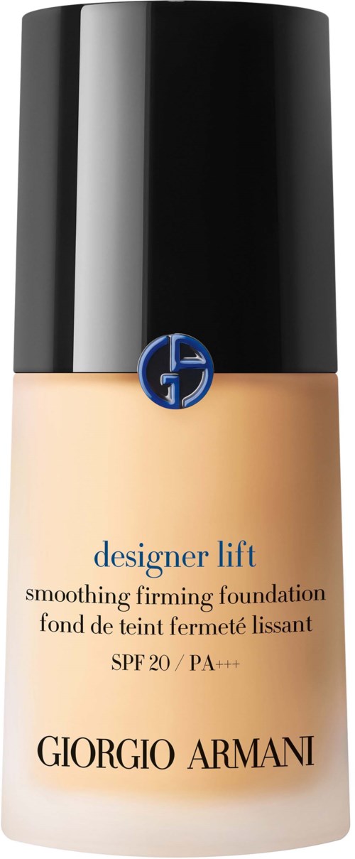En flaska Giorgio Armani foundation med svart lock och ljusbeige vätska inuti.