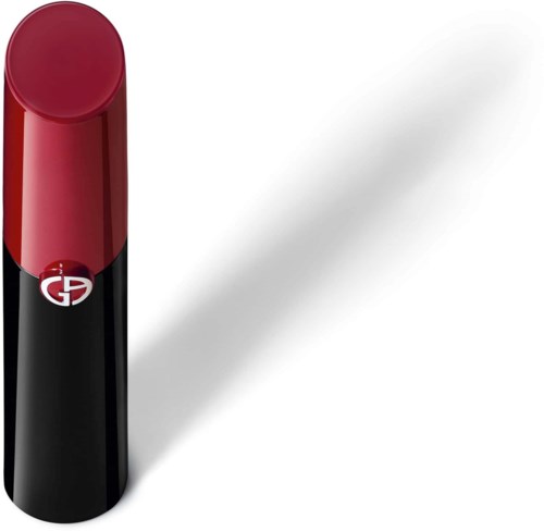 Red and black lipstick with Giorgio Armani logo, casting a shadow on a white background.